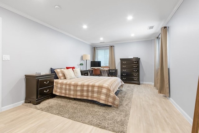 666 Main St Unit 206, Winchester, MA 01890 - bedroom featuring light wood-style floors, crown molding, baseboards, recessed lighting, and a desk