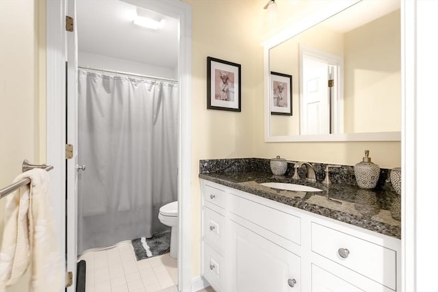 666 Main St Unit 206, Winchester, MA 01890 - full bathroom featuring vanity, toilet, and tile patterned floors