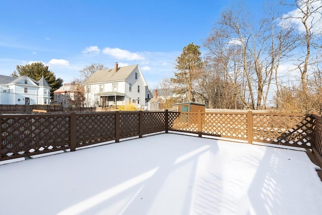 view of yard covered in snow