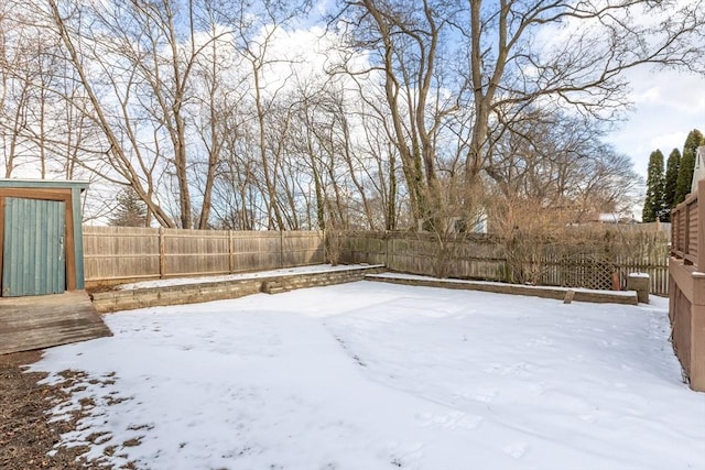 view of yard covered in snow