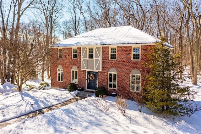 view of front of home with brick siding