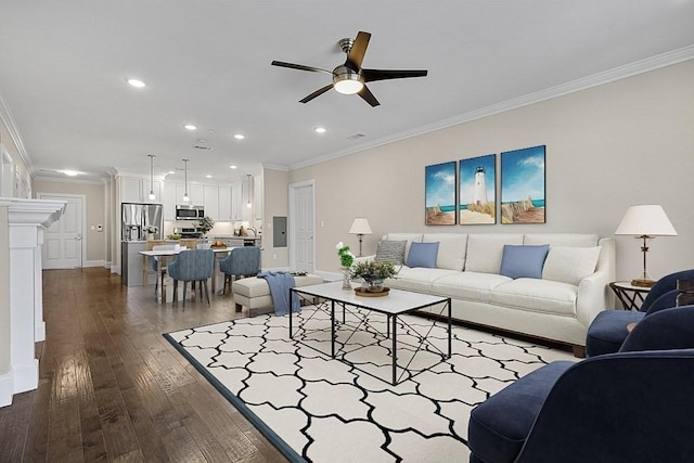 living room featuring dark wood-style floors, recessed lighting, a ceiling fan, baseboards, and ornamental molding