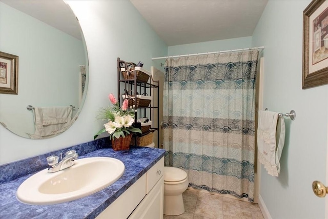 bathroom featuring tile patterned flooring, toilet, vanity, and a shower with curtain