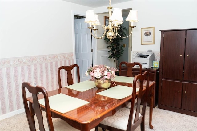 93 Mccracken Rd, Millbury, MA 01527 - dining space with a chandelier, light colored carpet, and wallpapered walls