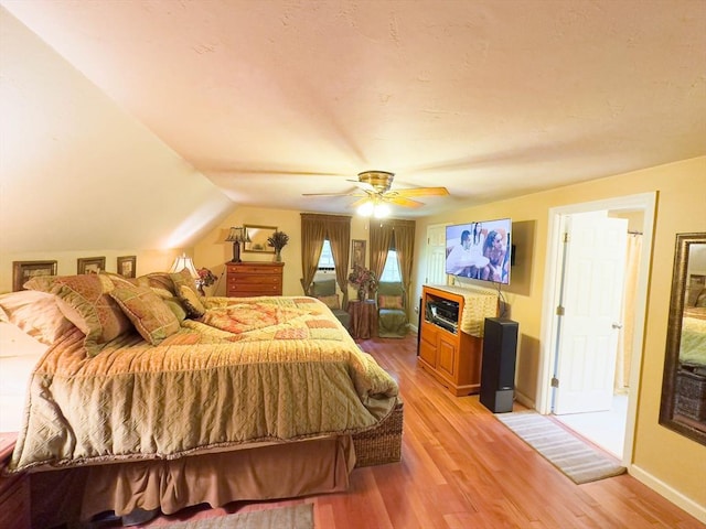93 Mccracken Rd, Millbury, MA 01527 - bedroom featuring light wood-style flooring, ceiling fan, vaulted ceiling, and baseboards