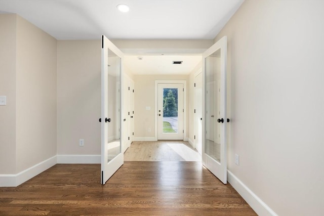 47 Jacob St, Seekonk, MA 02769 - foyer entrance with french doors, wood finished floors, baseboards, and recessed lighting