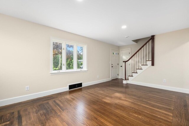 47 Jacob St, Seekonk, MA 02769 - unfurnished living room featuring baseboards, stairs, dark wood finished floors, and recessed lighting