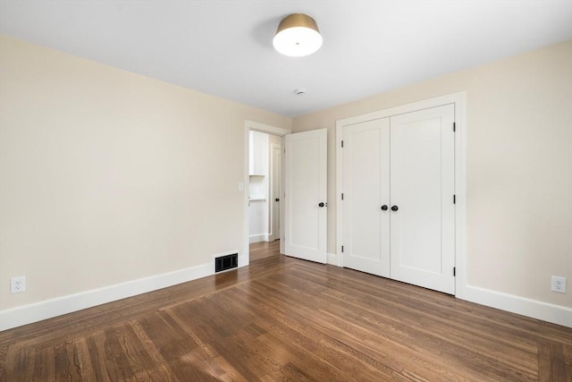 47 Jacob St, Seekonk, MA 02769 - unfurnished bedroom featuring baseboards, wood finished floors, and a closet