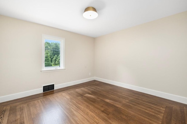 47 Jacob St, Seekonk, MA 02769 - empty room with baseboards and dark wood-style flooring