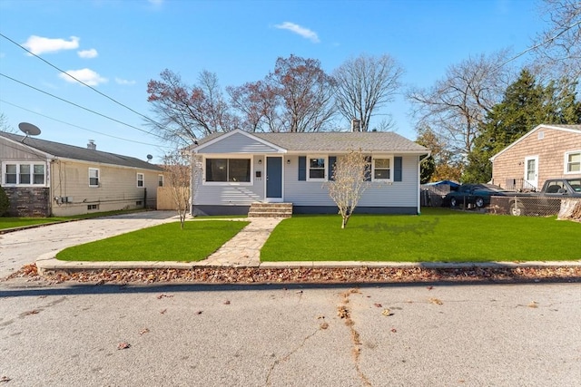 view of front of home with a front yard