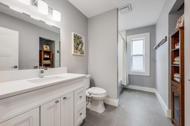510 Dorchester Ave Unit 2R, Boston, MA 02127 - bathroom with vanity, toilet, tile patterned floors, baseboards, and shower / tub combo with curtain