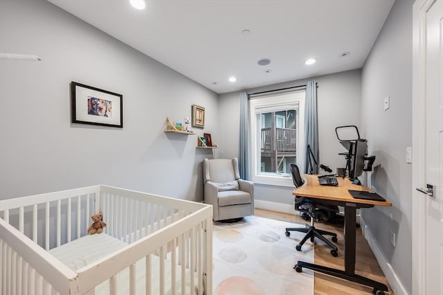 510 Dorchester Ave Unit 2R, Boston, MA 02127 - bedroom with wood finished floors, recessed lighting, a desk, and baseboards