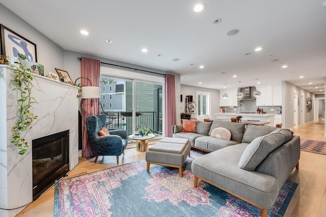 510 Dorchester Ave Unit 2R, Boston, MA 02127 - living room with recessed lighting, light wood finished floors, and a premium fireplace