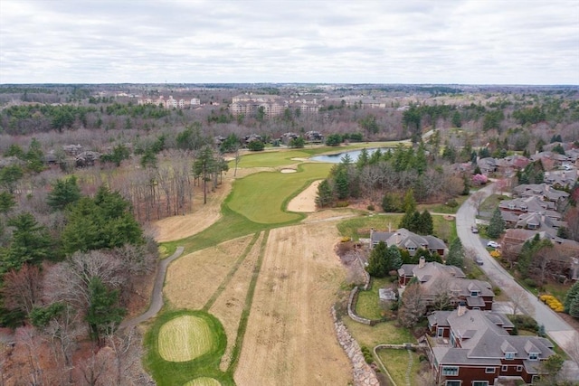 bird's eye view featuring view of golf course, a residential view, and a water view