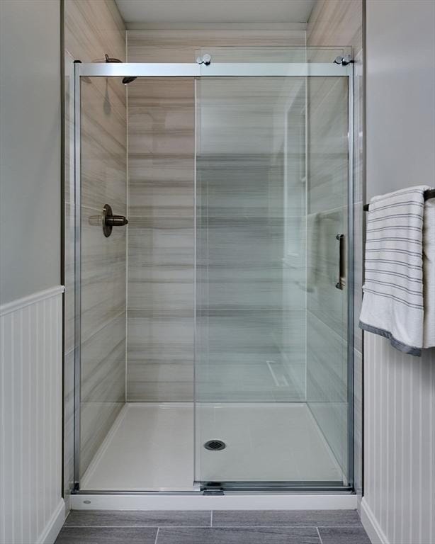 full bathroom featuring a shower stall