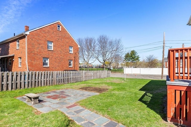 view of yard with a patio area and fence