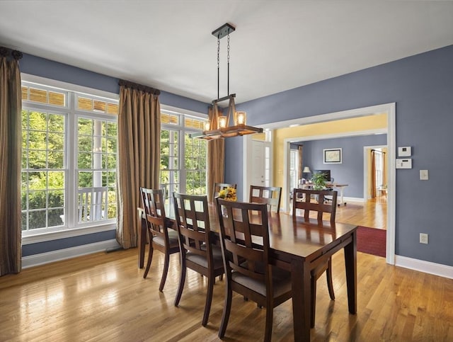 455 Brockelman Rd, Lancaster, MA 01523 - dining space featuring a chandelier and light wood-type flooring