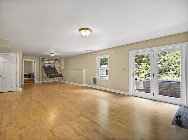 455 Brockelman Rd, Lancaster, MA 01523 - unfurnished living room featuring light wood-type flooring