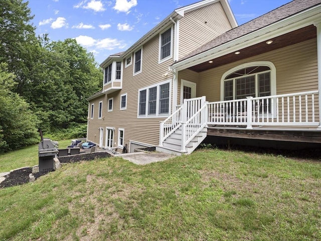 455 Brockelman Rd, Lancaster, MA 01523 - back of house featuring a yard