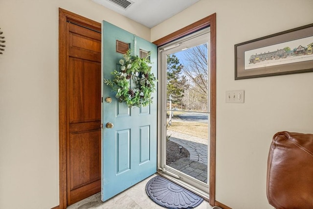 doorway to outside featuring visible vents