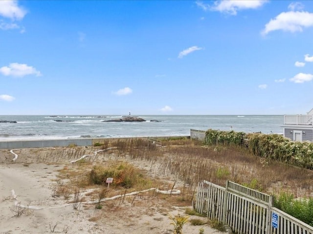 property view of water featuring a beach view