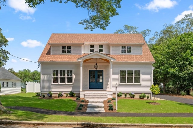 14 Norman Ave, Newburyport, MA 01950 - view of front of house with a shingled roof and french doors