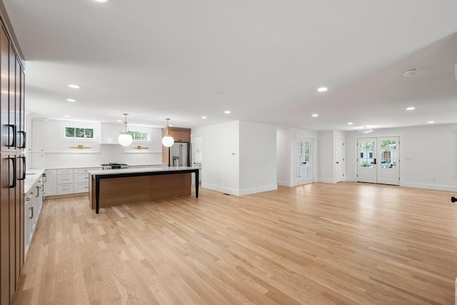 14 Norman Ave, Newburyport, MA 01950 - living area with recessed lighting, light wood-style flooring, and plenty of natural light