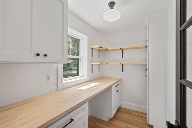 14 Norman Ave, Newburyport, MA 01950 - unfurnished office featuring built in desk and light wood-style floors