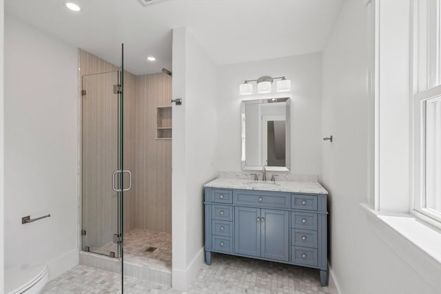 14 Norman Ave, Newburyport, MA 01950 - bathroom with a shower stall, vanity, recessed lighting, and a baseboard radiator