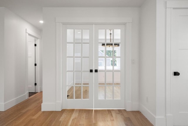 14 Norman Ave, Newburyport, MA 01950 - entryway with light wood-type flooring, french doors, and recessed lighting