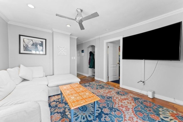 92 Winthrop Shore Dr Unit 2, Winthrop, MA 02152 - living area with crown molding, wood finished floors, ceiling fan, baseboards, and recessed lighting