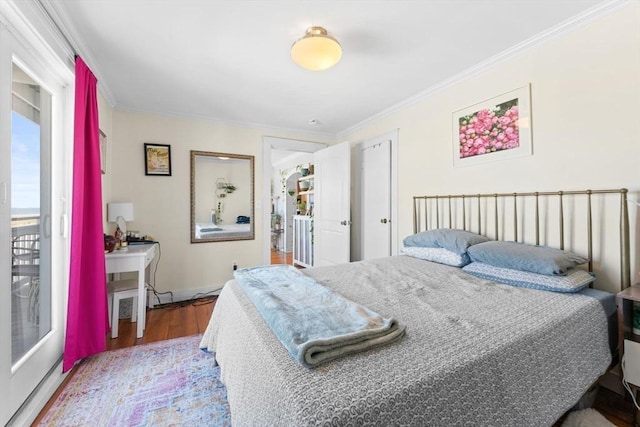 92 Winthrop Shore Dr Unit 2, Winthrop, MA 02152 - bedroom with crown molding and wood finished floors
