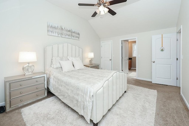 bedroom featuring lofted ceiling, ceiling fan, baseboards, and light colored carpet