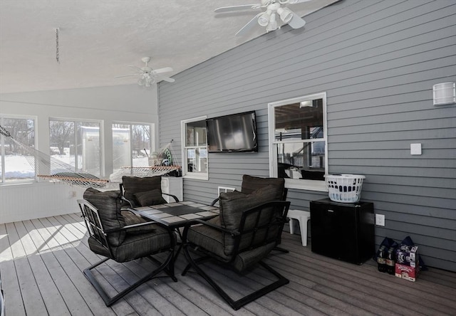 wooden deck with ceiling fan