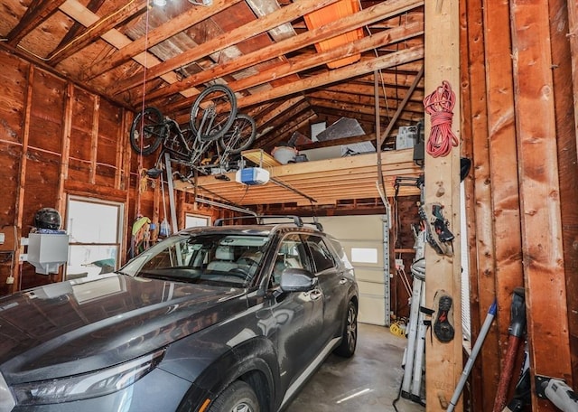 garage featuring a garage door opener