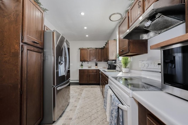 kitchen featuring under cabinet range hood, a sink, light countertops, stainless steel refrigerator with ice dispenser, and white range with electric cooktop