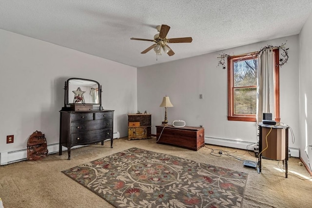 sitting room featuring a baseboard radiator, a textured ceiling, ceiling fan, and carpet