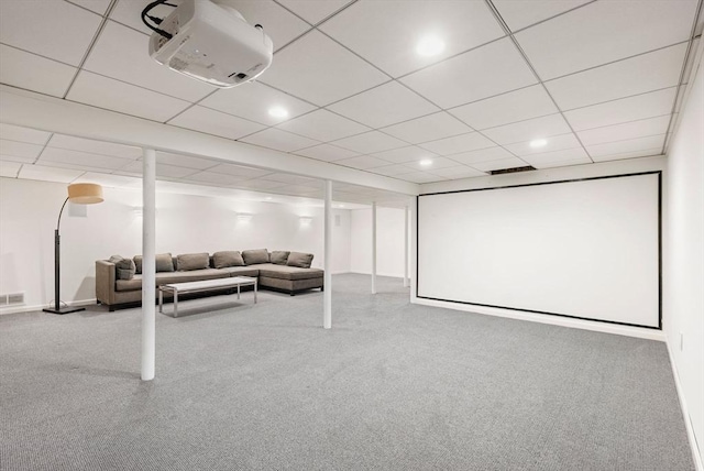 home theater room with a paneled ceiling