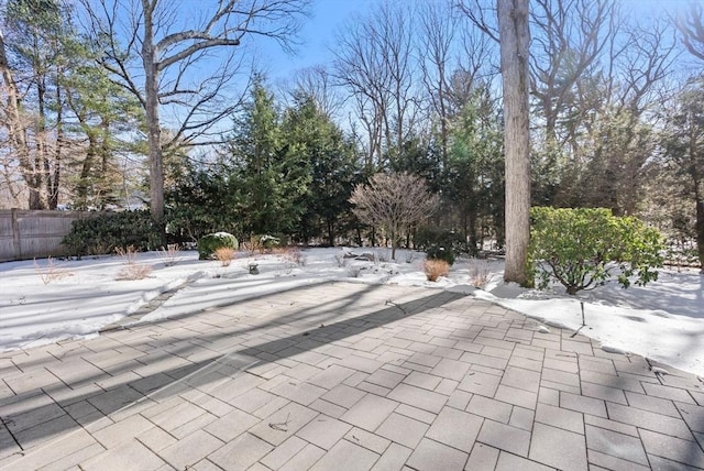 view of snow covered patio