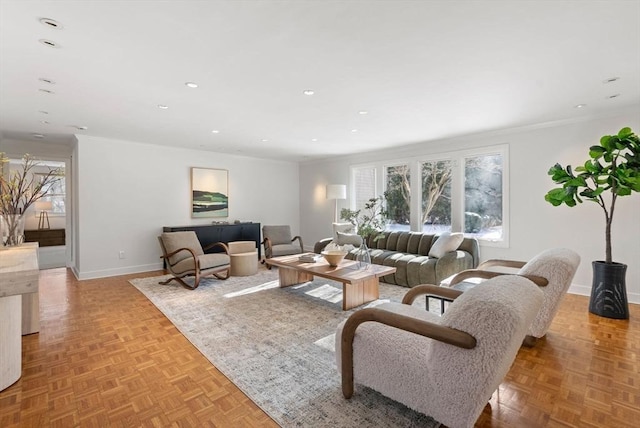 living room featuring crown molding and light parquet floors