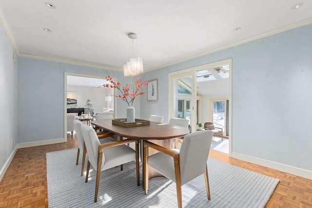 dining room featuring parquet floors and ornamental molding