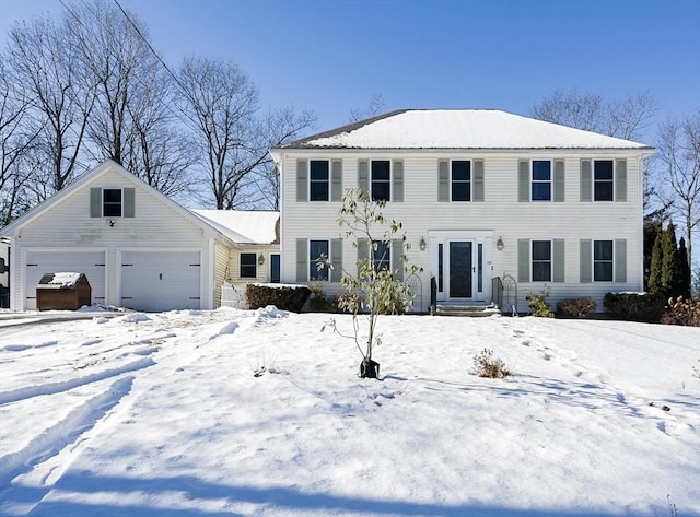 colonial home featuring a garage