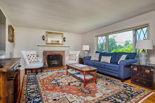 985 Tinkham Rd, Wilbraham, MA 01095 - living area featuring wood finished floors and a fireplace