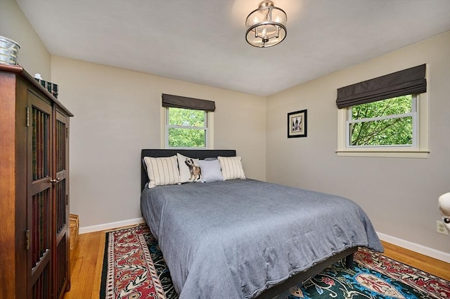 985 Tinkham Rd, Wilbraham, MA 01095 - bedroom with wood finished floors and baseboards