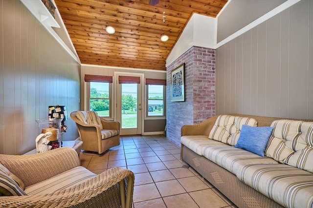 985 Tinkham Rd, Wilbraham, MA 01095 - living area with lofted ceiling, light tile patterned flooring, wooden ceiling, and wood walls