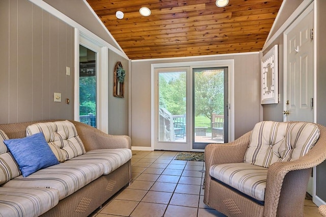 985 Tinkham Rd, Wilbraham, MA 01095 - living area with vaulted ceiling, wood ceiling, light tile patterned floors, and wooden walls