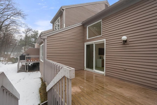 view of snow covered deck