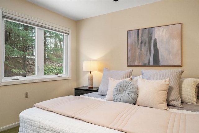 bedroom featuring carpet