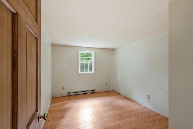 336 Otter River Rd, Templeton, MA 01468 - spare room with baseboard heating and light wood-type flooring