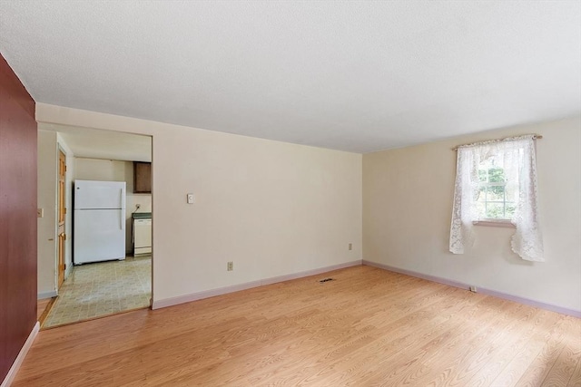 336 Otter River Rd, Templeton, MA 01468 - spare room with light wood-type flooring and baseboards